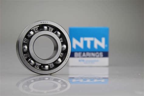 Ntn bearing - Feb 28, 2024 · NTN’s SFCW Bearing Units Keep Production Rolling on Cookie Topping Line. NTN’s engineering and sales support team performed a thorough evaluation of the line and concluded the double-row shielded angular contact bearings were failing as a result of flaking damage to the internal components. 